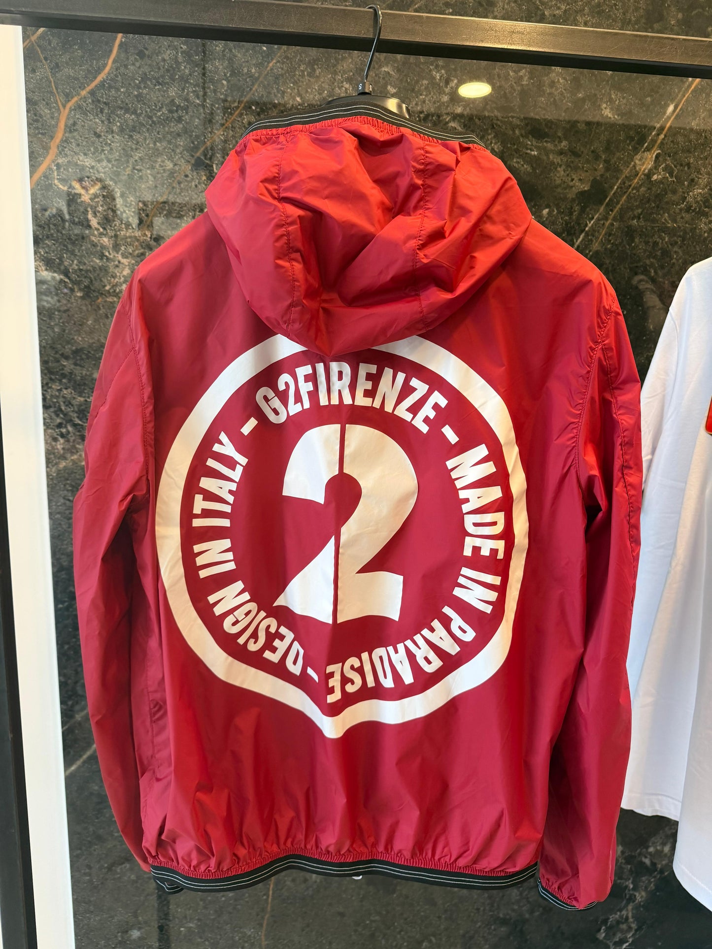 G2FIRENZE - Giacca a vento con cappuccio red maxi logo sul retro | Christian Store