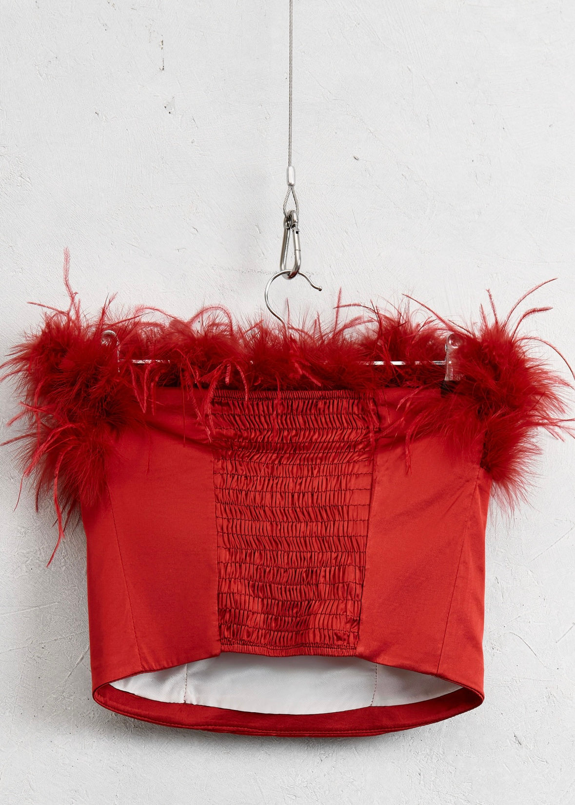 Lumina - Top rosso raso e piume | Christian Store