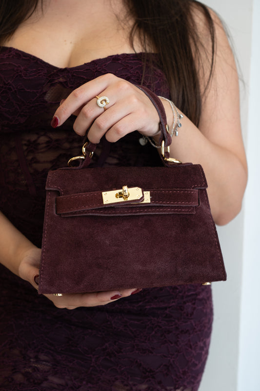 Mini borsa a mano donna in camoscio bordeaux con chiusura girevole dorata – Borsa elegante da sera | Christian Store