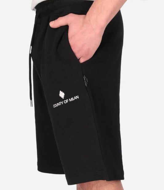 County of Milan by Marcelo Burlon - Bermuda uomo black logo laterale | Christian Store